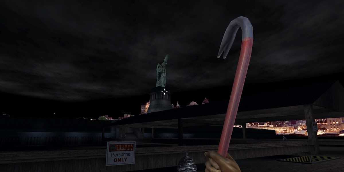 holding a crowbar and looking at the Statue of Liberty in Deus Ex