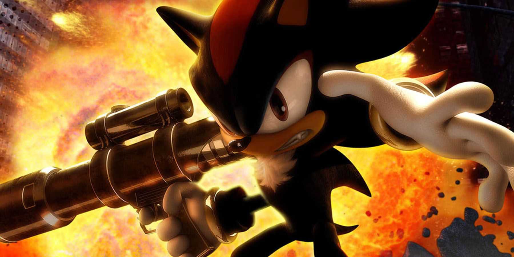 Uma imagem promocional de Shadow parado em frente a uma explosão enquanto segura uma arma no jogo Shadow the Hedgehog.