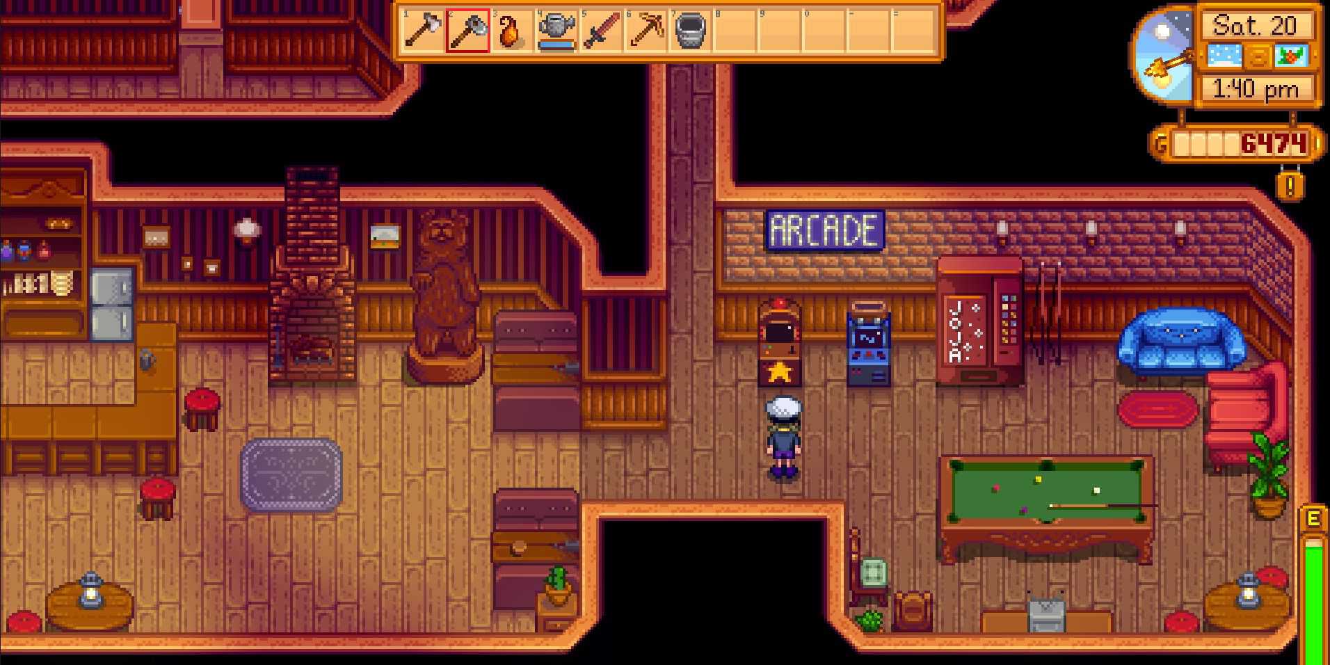 Imagem de um personagem se aproximando do gabinete de fliperama Journey of the Prairie King em Stardew Valley