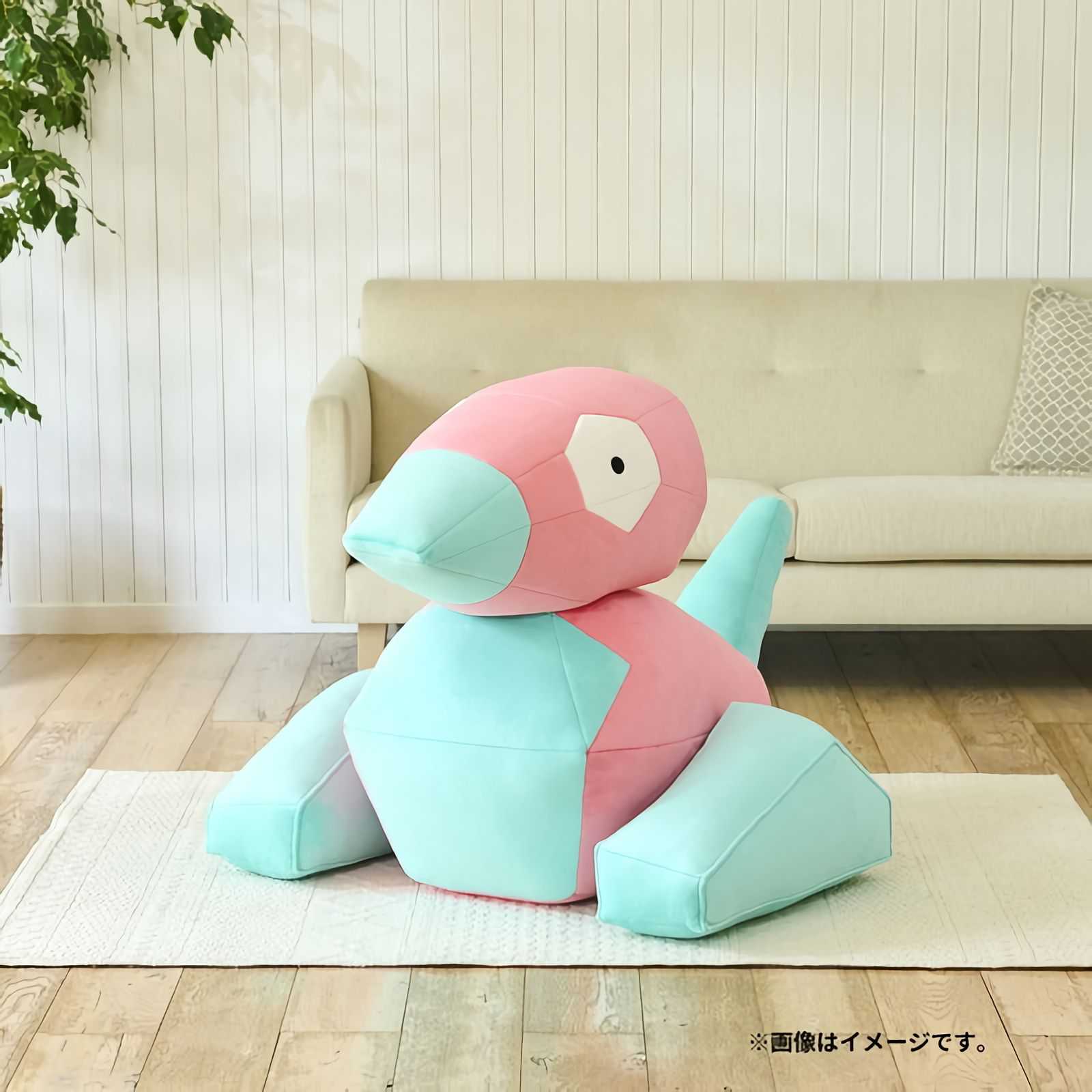 An official promotional image of the life-size Porygon plush.