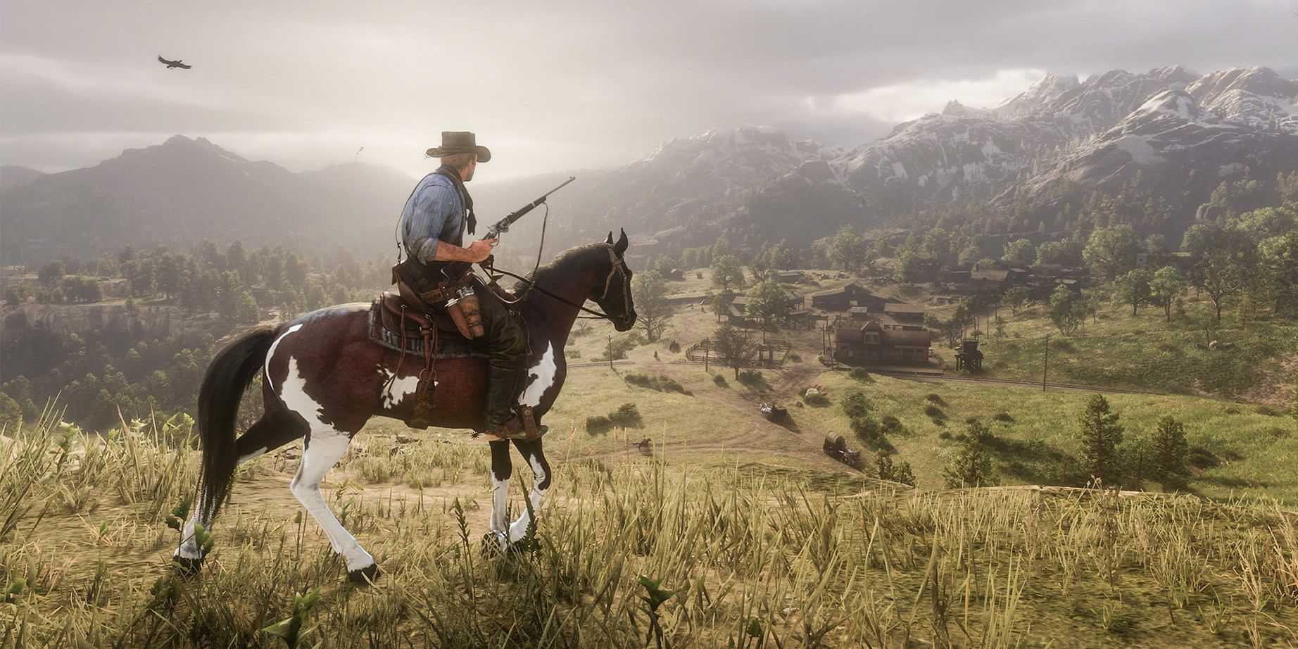 Red Dead Redemption 2 Arthur andando a cavalo em uma cordilheira