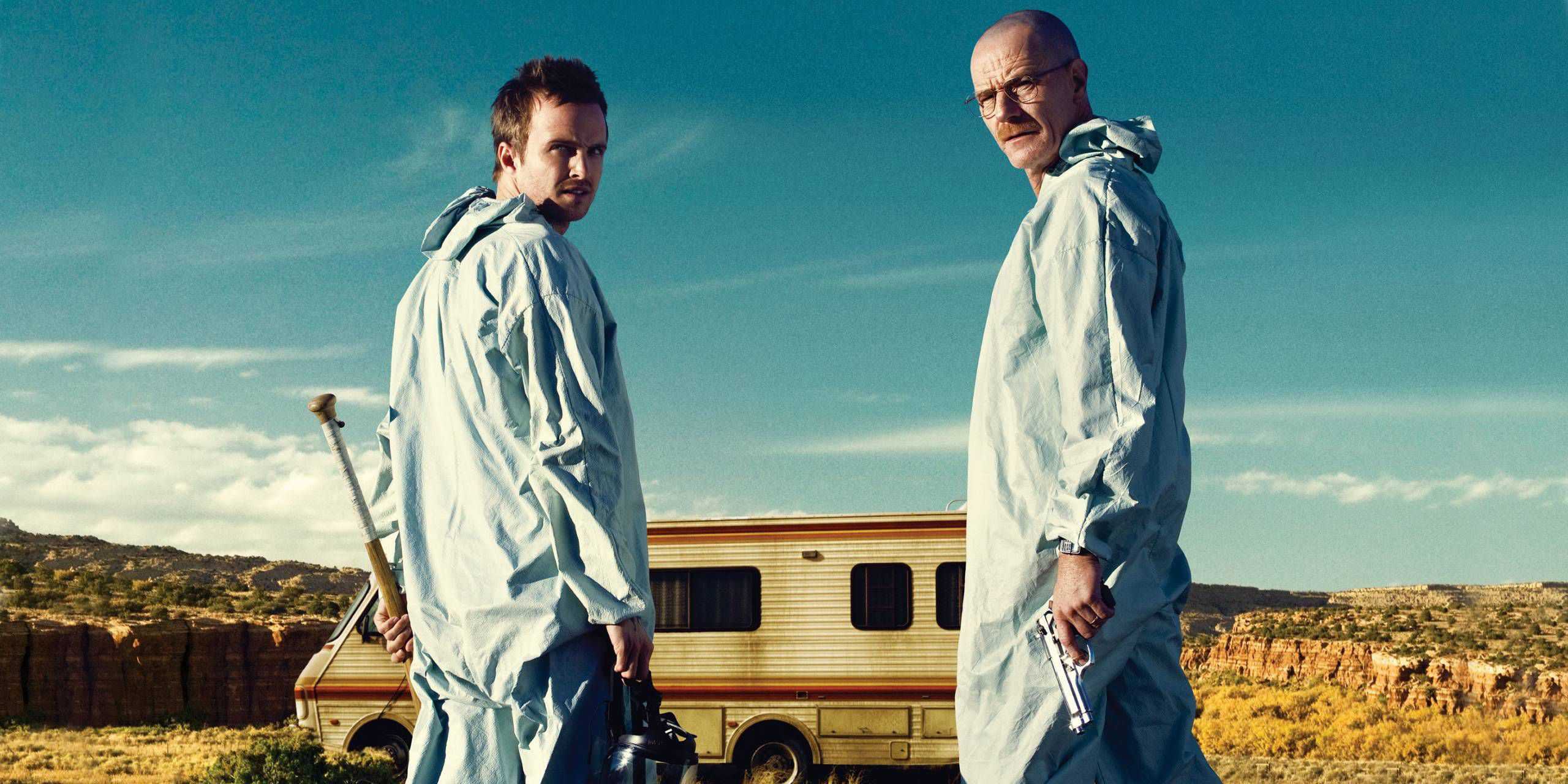 Walter and Jesse in Hazmat suits in front of their RV in Breaking Bad