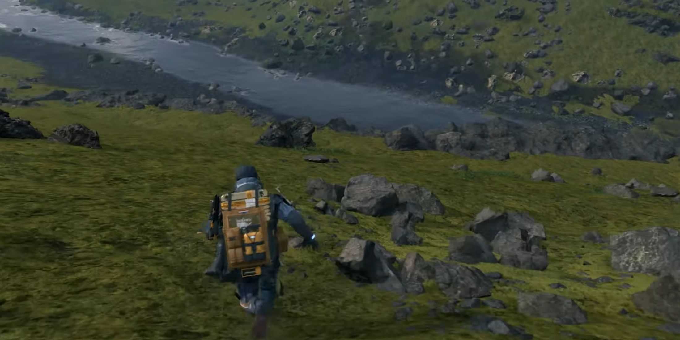 Cliff approaches a river in Death Stranding