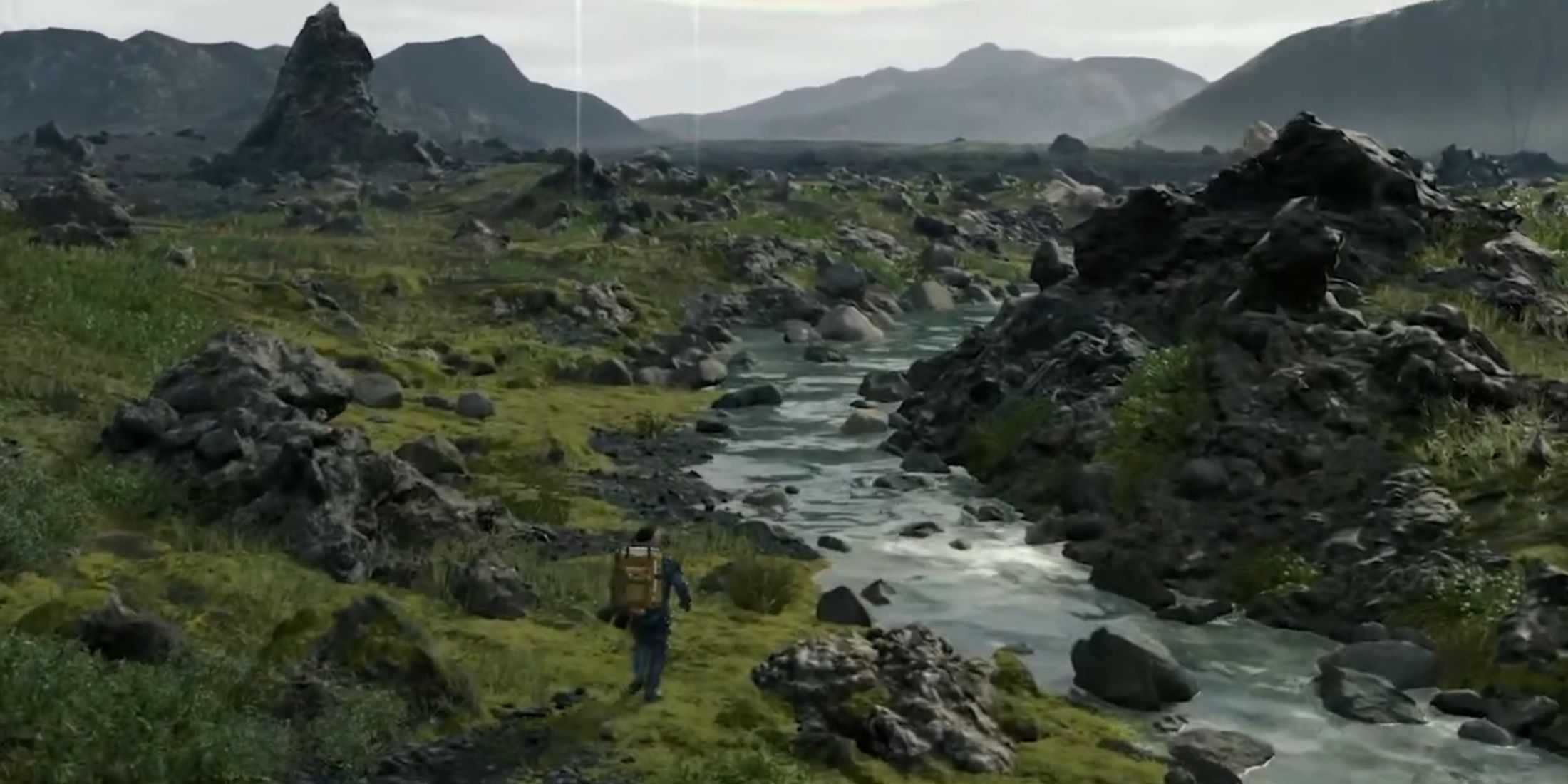 Cliff walks towards a river filled with rocks