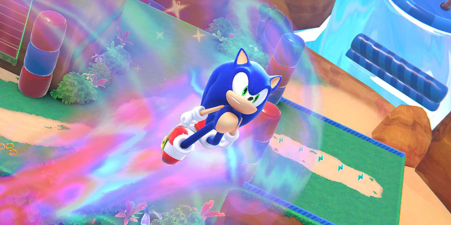 Uma captura de tela de Sonic the Hedgehog explodindo no ar acima de um colorido mundo de sonho em Sonic Dream Team.