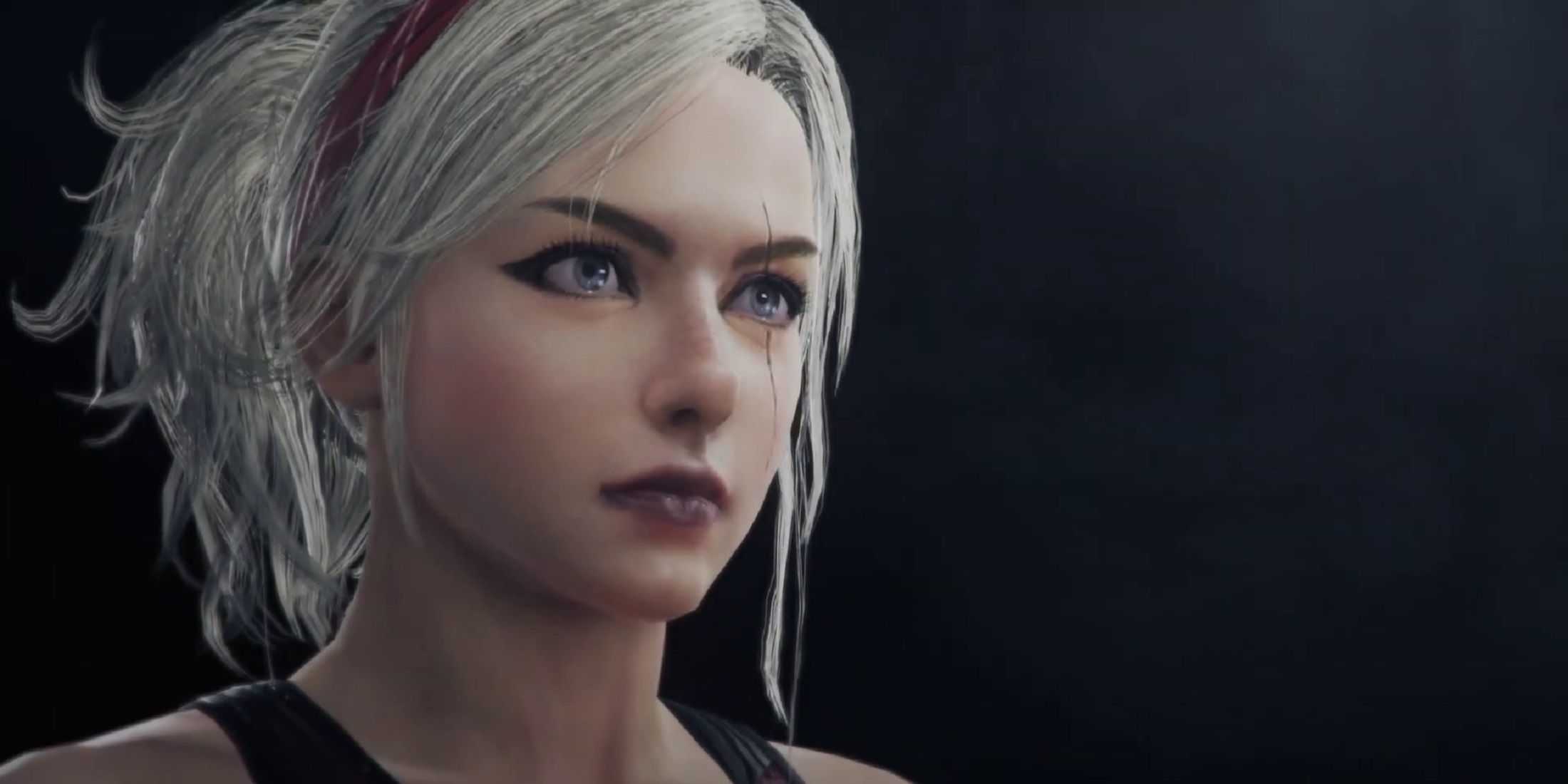 Lidia Sobieska from Tekken 7 with a focused expression, her blonde hair tied back with a red headband, set against a dark background.