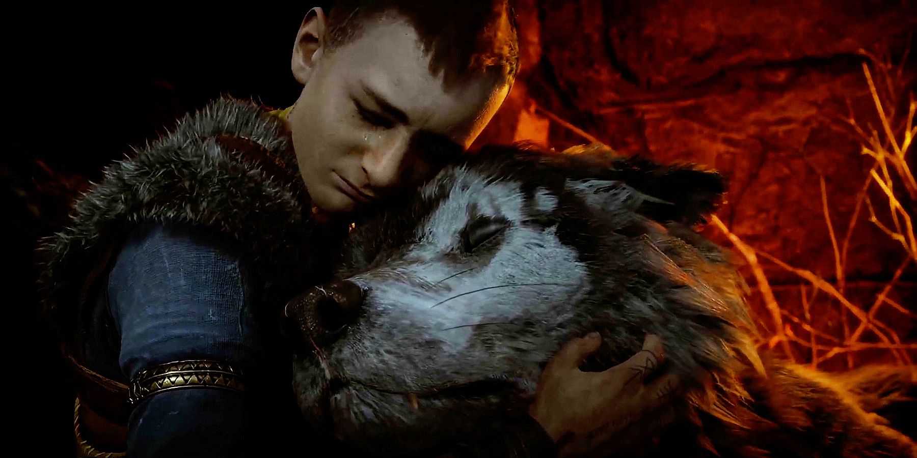 Atreus segurando um Fenrir moribundo em God of War Ragnarok