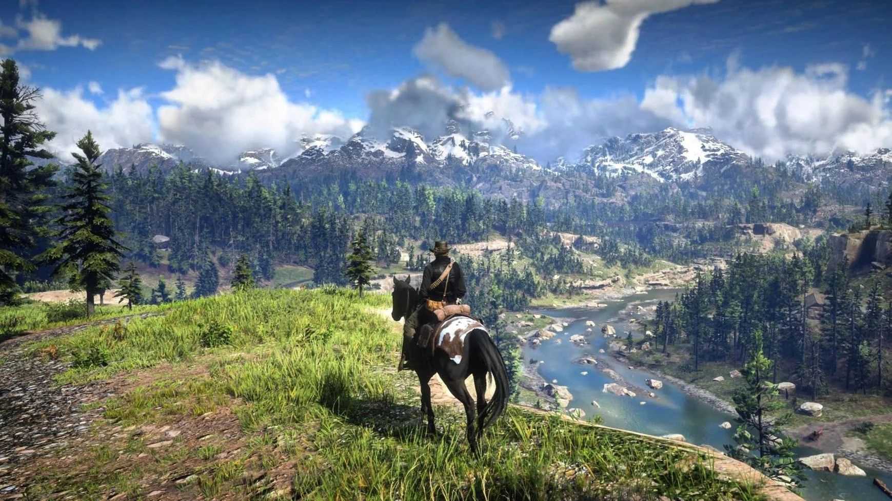 red dead redemption 2 arthur morgan looking at the mountains