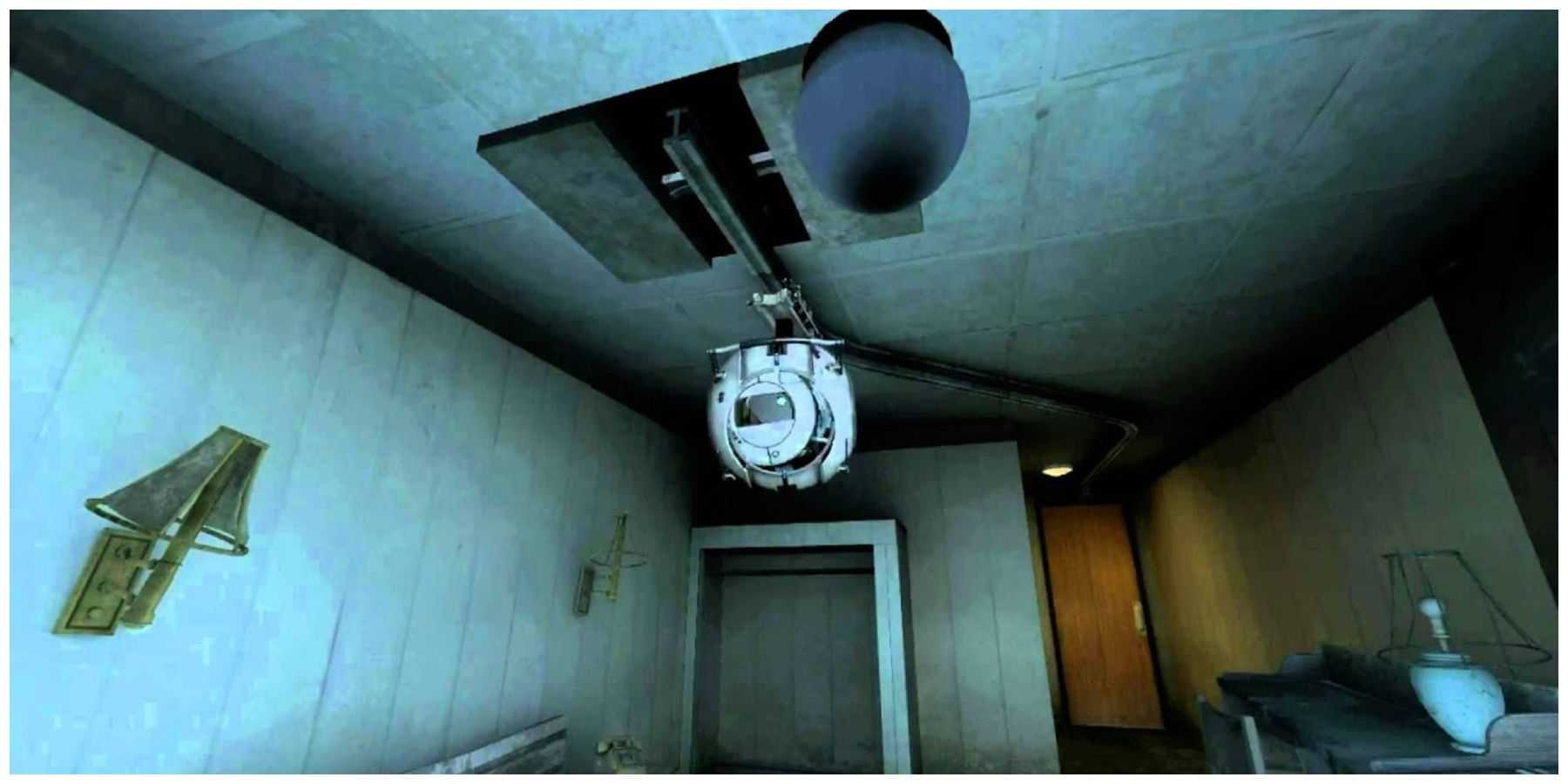 A spherical robot Wheatly on rails on the ceiling