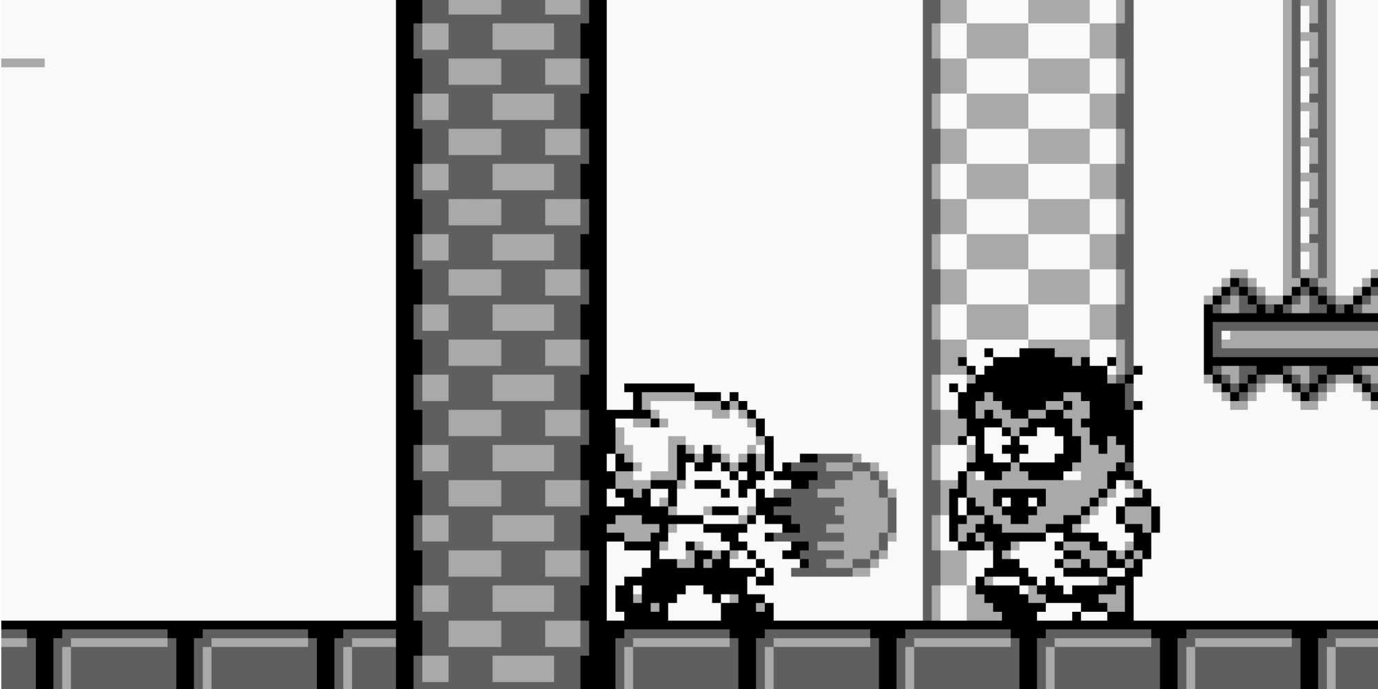 Fighting enemies in Kid Dracula (Game Boy)