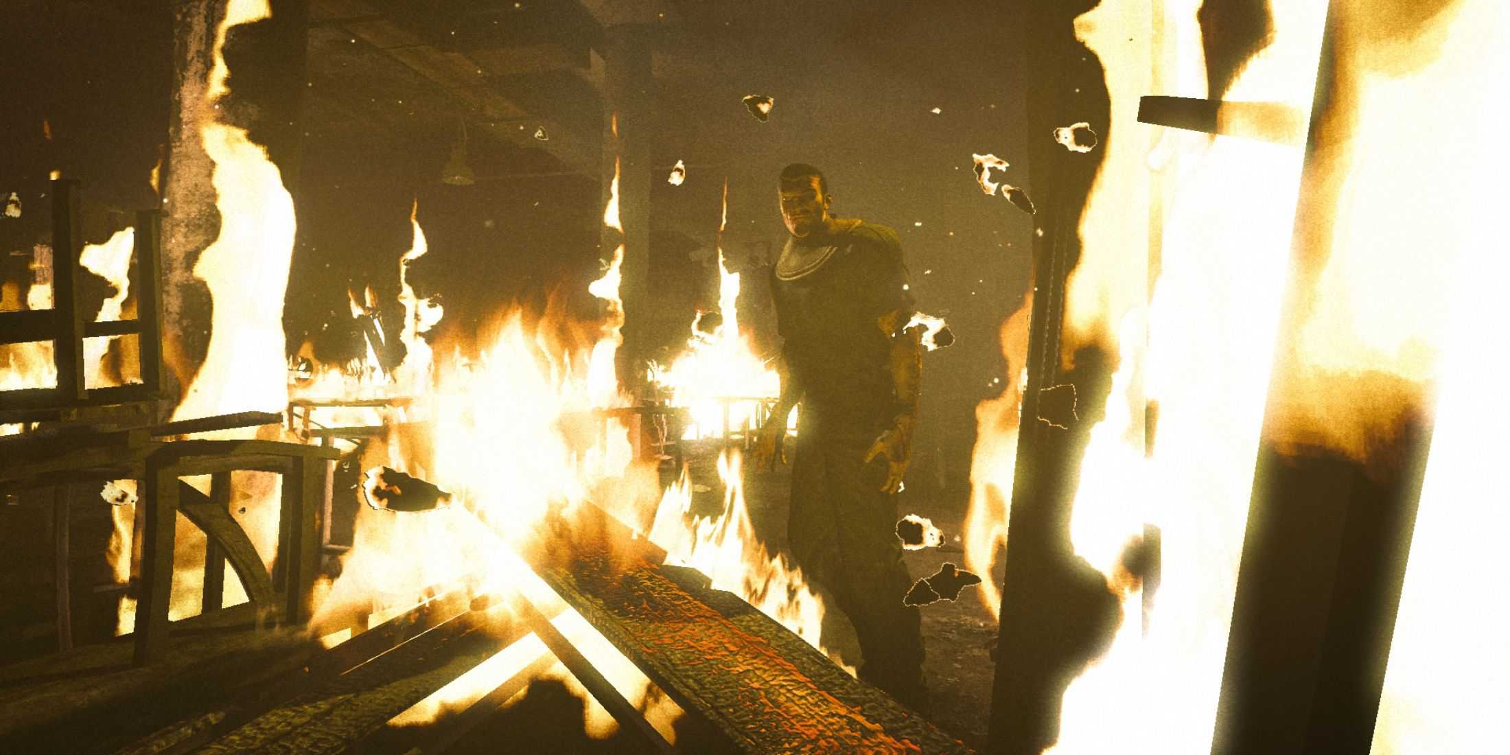 A man standing in the middle of a burning building