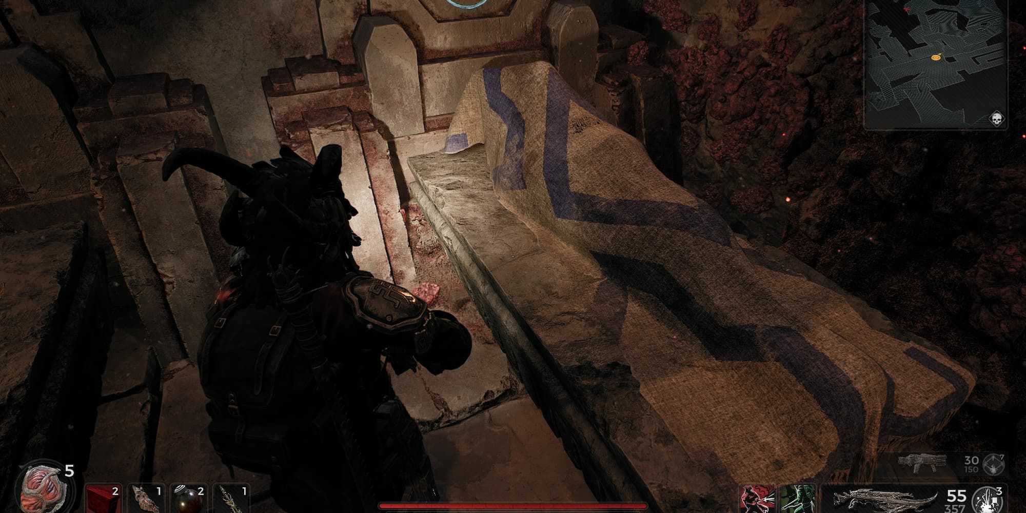 Dead bodies covered by tapestry in Remnant 2's Lament dungeon